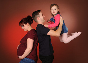Schwangere, Partner und Tochter 
