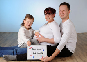 Schwangerschafts-Portrait mit Familie